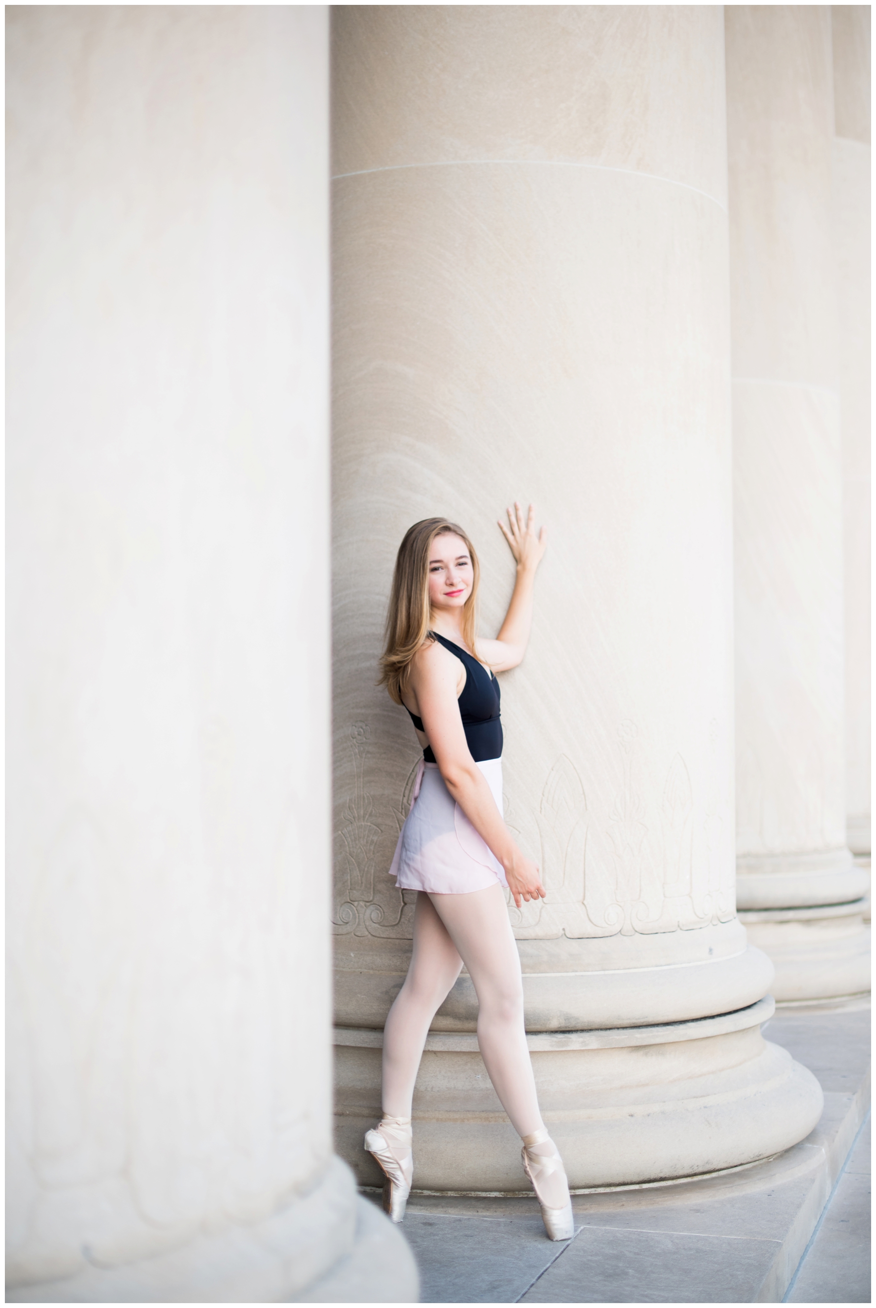An elegant high school senior photo shoot in downtown kansas city at nelson atkins museum with modern dance and sunset lighting